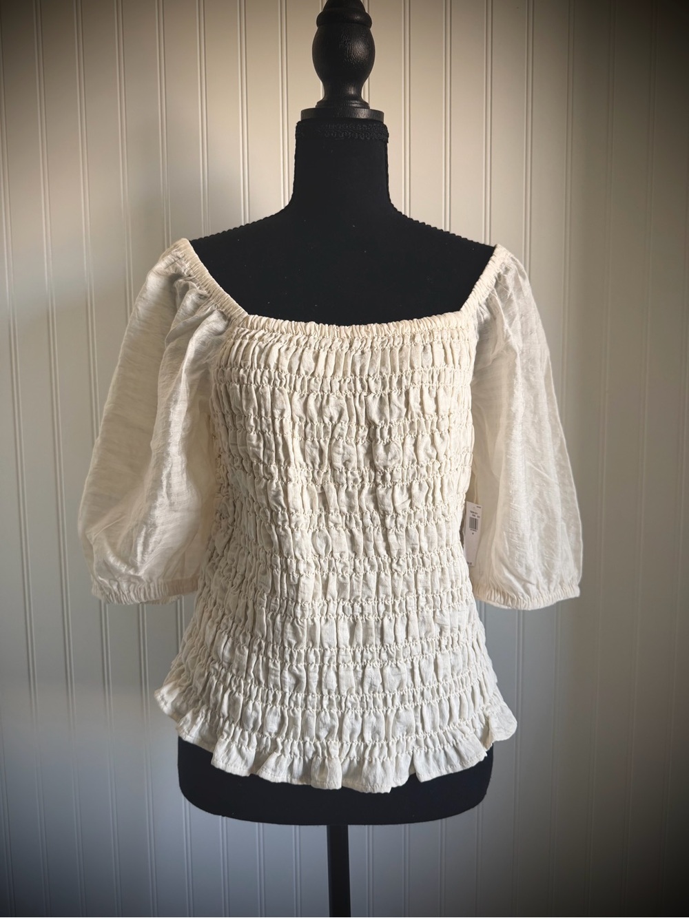 Smocked Off-Shoulder Peasant Top in Cream